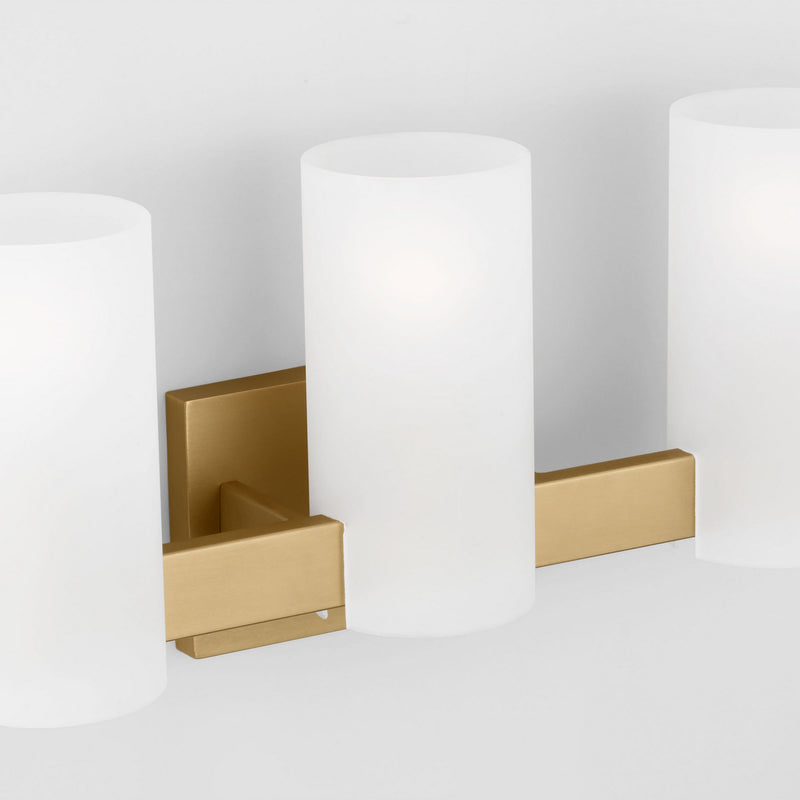 Three Light Vanity<br /><span style="color:#4AB0CE;">Entrega: 4-10 dias en USA</span><br /><span style="color:#4AB0CE;font-size:60%;">PREGUNTE POR ENTREGA EN PANAMA</span><br />Collection: Rhode<br />Finish: Satin Brass