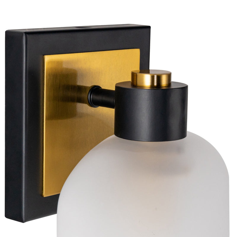 One Light Bathroom Sconce<br /><span style="color:#4AB0CE;">Entrega: 4-10 dias en USA</span><br /><span style="color:#4AB0CE;font-size:60%;">PREGUNTE POR ENTREGA EN PANAMA</span><br />Collection: Lyndon<br />Finish: Black and Brushed Brass