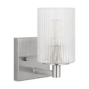 One Light Wall / Bath Sconce<br /><span style="color:#4AB0CE;">Entrega: 4-10 dias en USA</span><br /><span style="color:#4AB0CE;font-size:60%;">PREGUNTE POR ENTREGA EN PANAMA</span><br />Collection: Lando<br />Finish: Brushed Steel