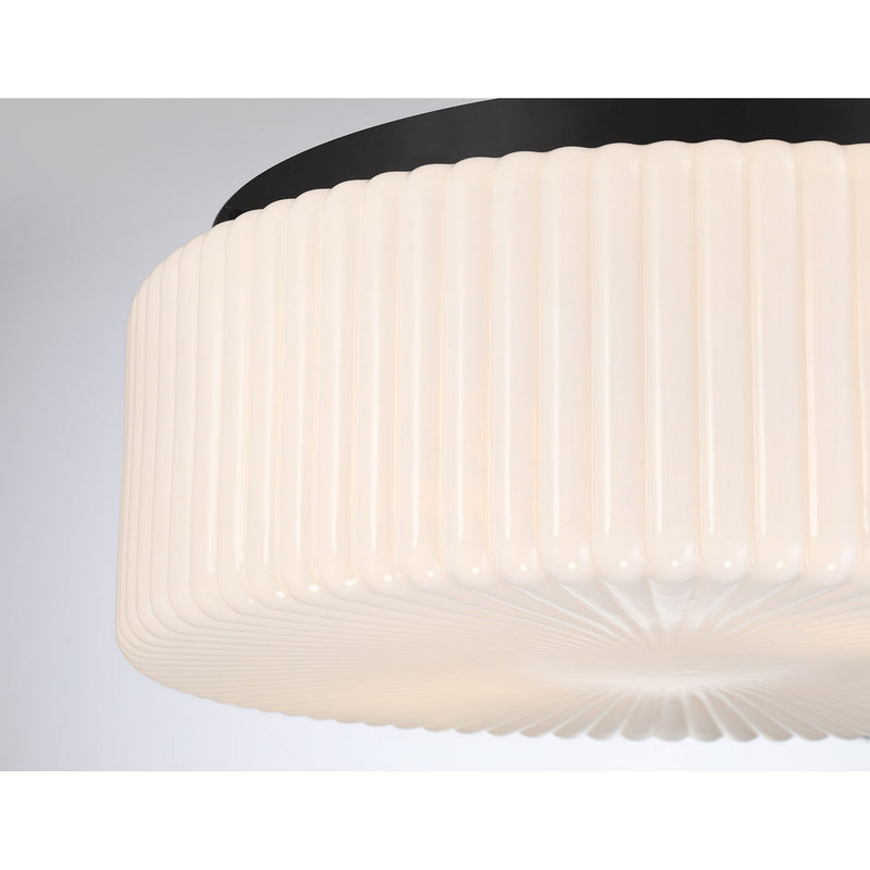 Four Light Flush Mount<br /><span style="color:#4AB0CE;">Entrega: 4-10 dias en USA</span><br /><span style="color:#4AB0CE;font-size:60%;">PREGUNTE POR ENTREGA EN PANAMA</span><br />Collection: Edgemont<br />Finish: Matte Black