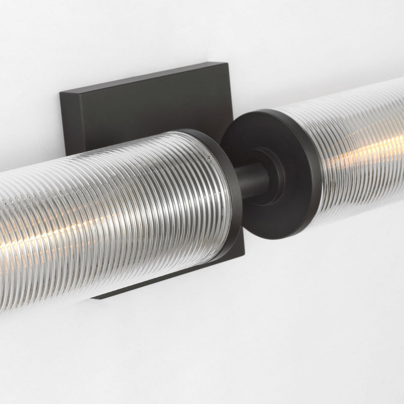 Two Light Wall Sconce<br /><span style="color:#4AB0CE;">Entrega: 4-10 dias en USA</span><br /><span style="color:#4AB0CE;font-size:60%;">PREGUNTE POR ENTREGA EN PANAMA</span><br />Collection: Sarita<br />Finish: Midnight Black