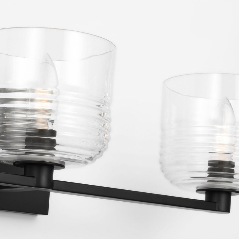 Three Light Vanity<br /><span style="color:#4AB0CE;">Entrega: 4-10 dias en USA</span><br /><span style="color:#4AB0CE;font-size:60%;">PREGUNTE POR ENTREGA EN PANAMA</span><br />Collection: Lochdale<br />Finish: Midnight Black