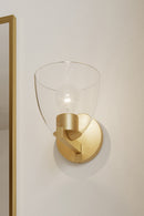 One Light Bath Sconce<br /><span style="color:#4AB0CE;">Entrega: 4-10 dias en USA</span><br /><span style="color:#4AB0CE;font-size:60%;">PREGUNTE POR ENTREGA EN PANAMA</span><br />Collection: Noellea<br />Finish: Legacy Brass