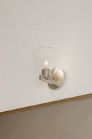 One Light Bath Sconce<br /><span style="color:#4AB0CE;">Entrega: 4-10 dias en USA</span><br /><span style="color:#4AB0CE;font-size:60%;">PREGUNTE POR ENTREGA EN PANAMA</span><br />Collection: Noellea<br />Finish: Brushed Nickel