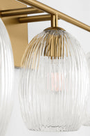 Three Light Bath<br /><span style="color:#4AB0CE;">Entrega: 4-10 dias en USA</span><br /><span style="color:#4AB0CE;font-size:60%;">PREGUNTE POR ENTREGA EN PANAMA</span><br />Collection: Serafina<br />Finish: Burnished Brass | Burnished Brass