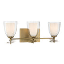 Three Light Vanity<br /><span style="color:#4AB0CE;">Entrega: 4-10 dias en USA</span><br /><span style="color:#4AB0CE;font-size:60%;">PREGUNTE POR ENTREGA EN PANAMA</span><br />Collection: Elowen<br />Finish: Legacy Brass