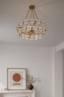 Four Light Pendant<br /><span style="color:#4AB0CE;">Entrega: 4-10 dias en USA</span><br /><span style="color:#4AB0CE;font-size:60%;">PREGUNTE POR ENTREGA EN PANAMA</span><br />Collection: Kintrel<br />Finish: Legacy Brass