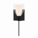 One Light Bath Sconce<br /><span style="color:#4AB0CE;">Entrega: 4-10 dias en USA</span><br /><span style="color:#4AB0CE;font-size:60%;">PREGUNTE POR ENTREGA EN PANAMA</span><br />Collection: Elowen<br />Finish: Dark Matte Black