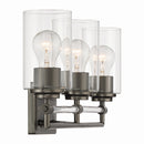 Three Light Vanity<br /><span style="color:#4AB0CE;">Entrega: 4-10 dias en USA</span><br /><span style="color:#4AB0CE;font-size:60%;">PREGUNTE POR ENTREGA EN PANAMA</span><br />Collection: Binsly<br />Finish: Rustic Gun Metal