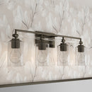 Four Light Vanity<br /><span style="color:#4AB0CE;">Entrega: 4-10 dias en USA</span><br /><span style="color:#4AB0CE;font-size:60%;">PREGUNTE POR ENTREGA EN PANAMA</span><br />Collection: Binsly<br />Finish: Rustic Gun Metal