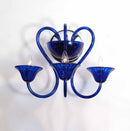 LÁMPARA DECORATIVA DE PARED. ACABADO EN VIDRIO AZUL
